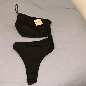 Never worn black body suit with cutouts